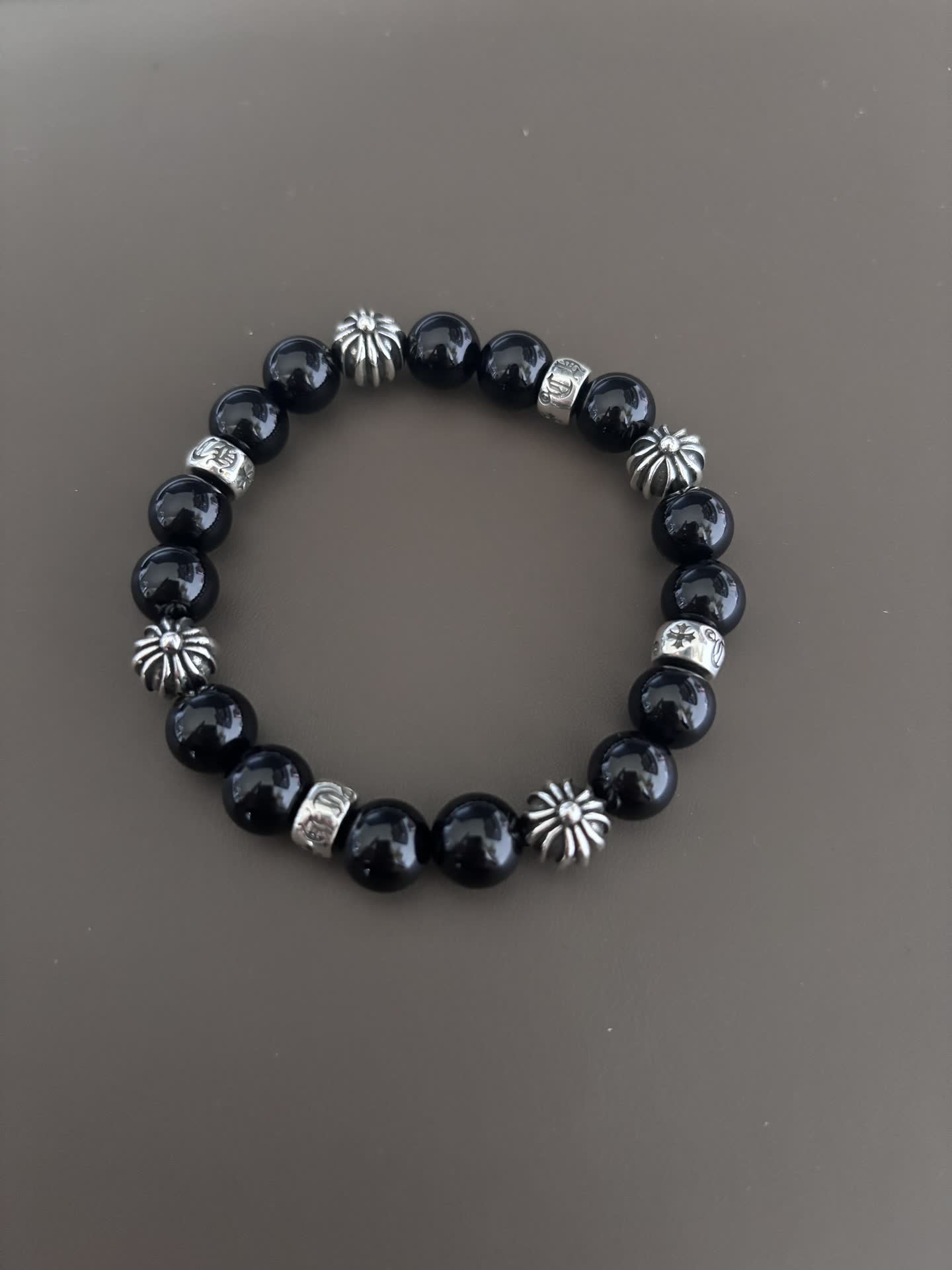Chrome Hearts Elegant Black Bead Bracelet with Silver Accents Chrome Hearts Elegant Black Bead Bracelet with Silver Accents